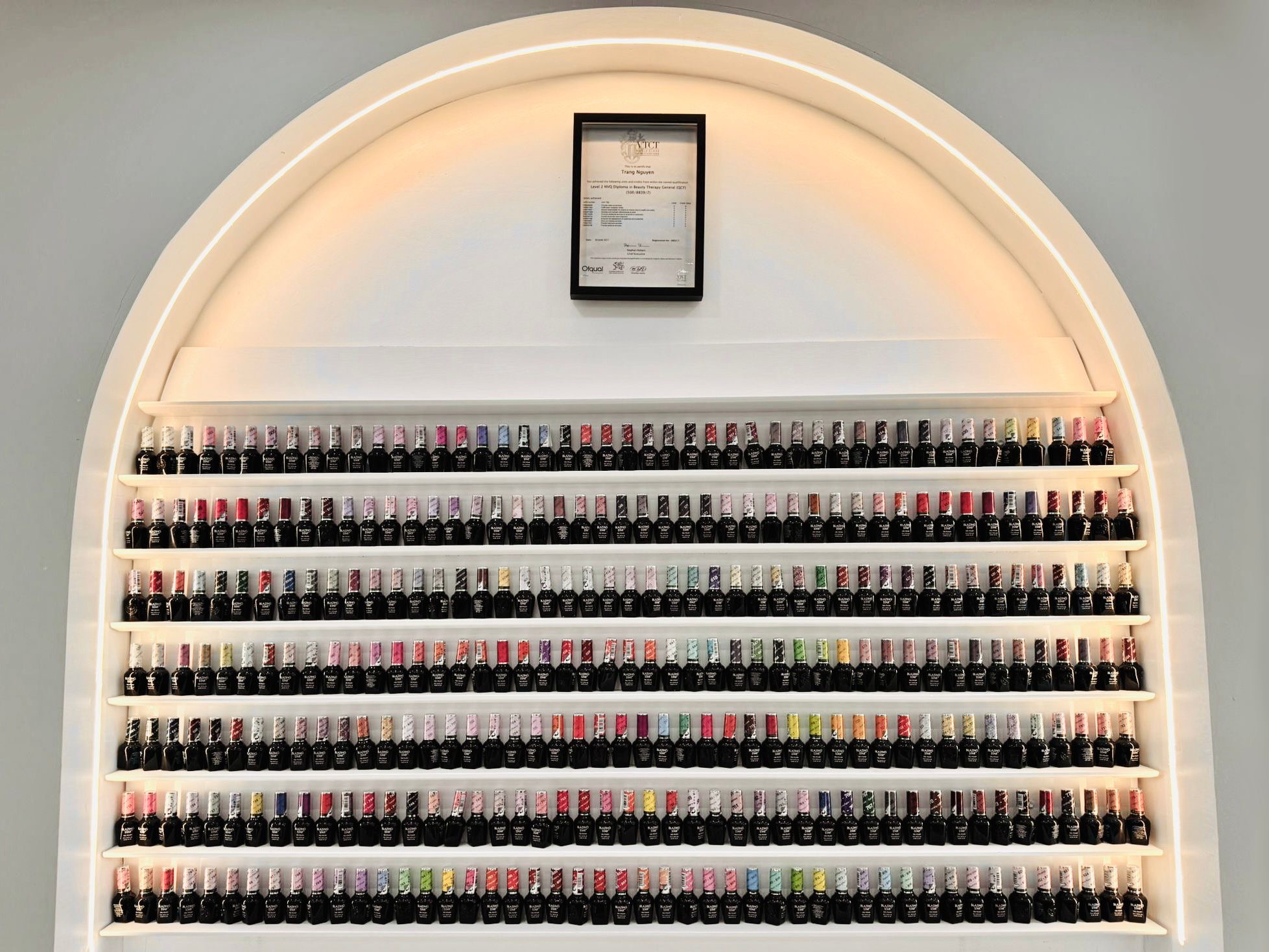 Wall of nail polish bottles